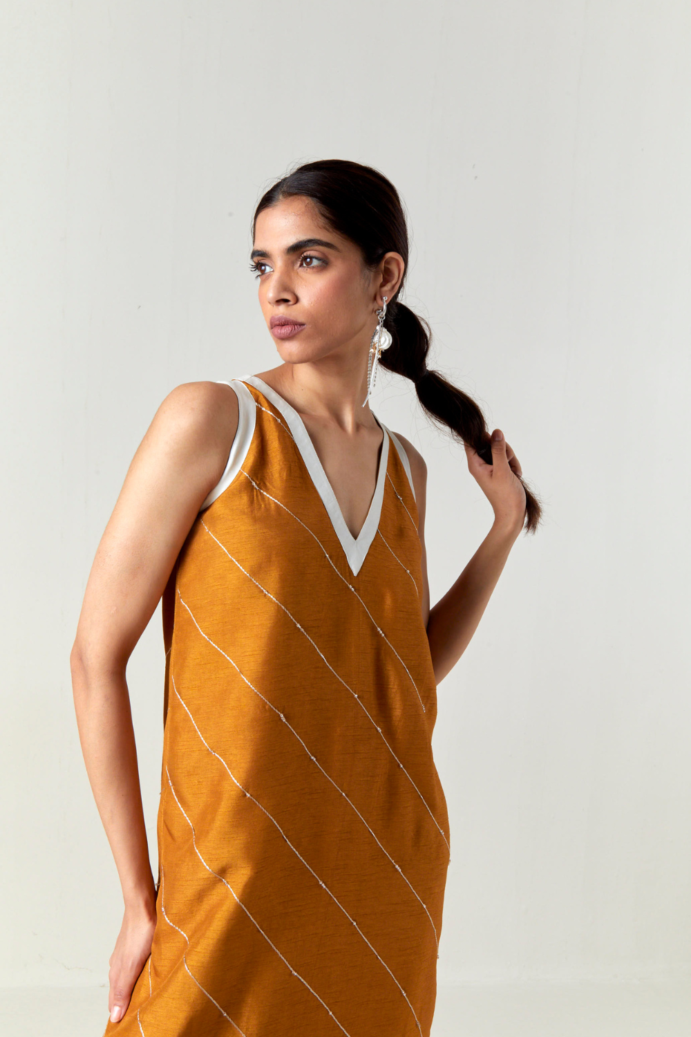 V-NECK EMBELLISHMENT DETAIL DRESS-OCHRE