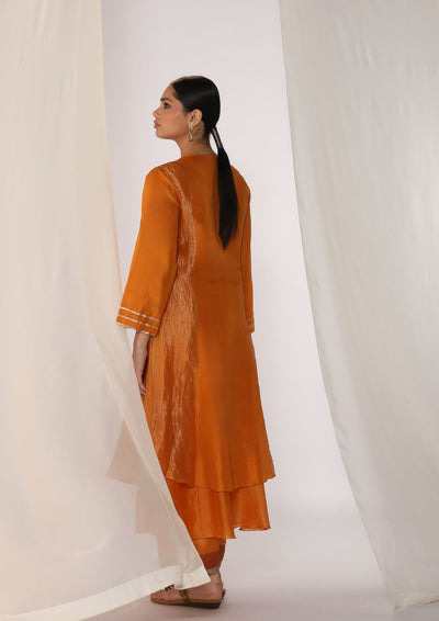 Double-layer kurta with handwork on neckline paired with pants