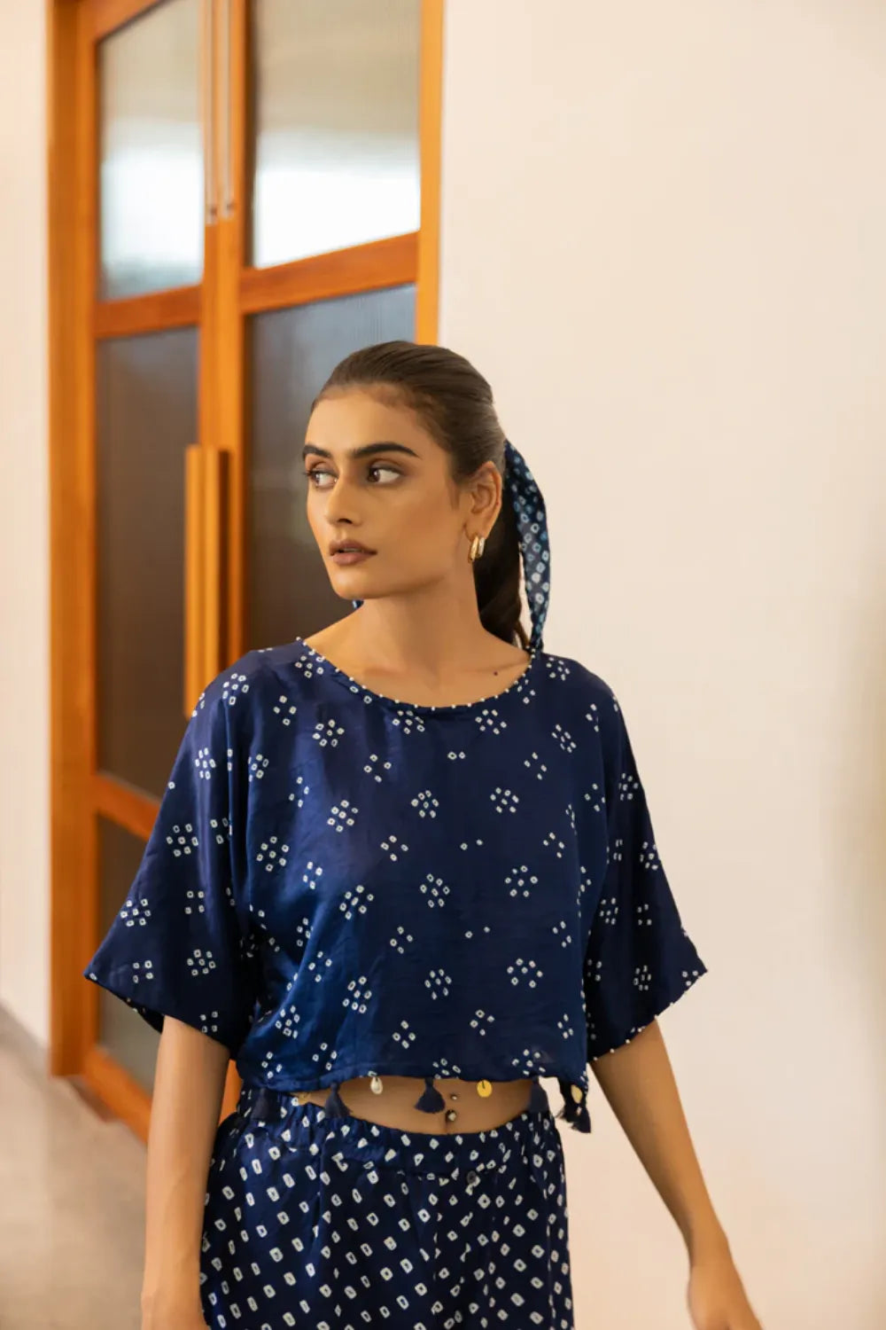 CROP TOP W TASSLES-NAVY BLUE